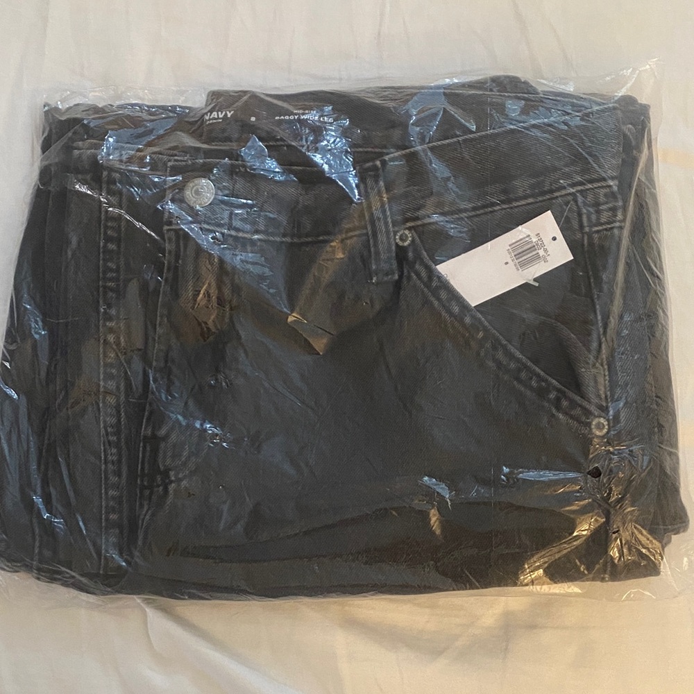 Black mid rise baggy wide leg cargo style jeans